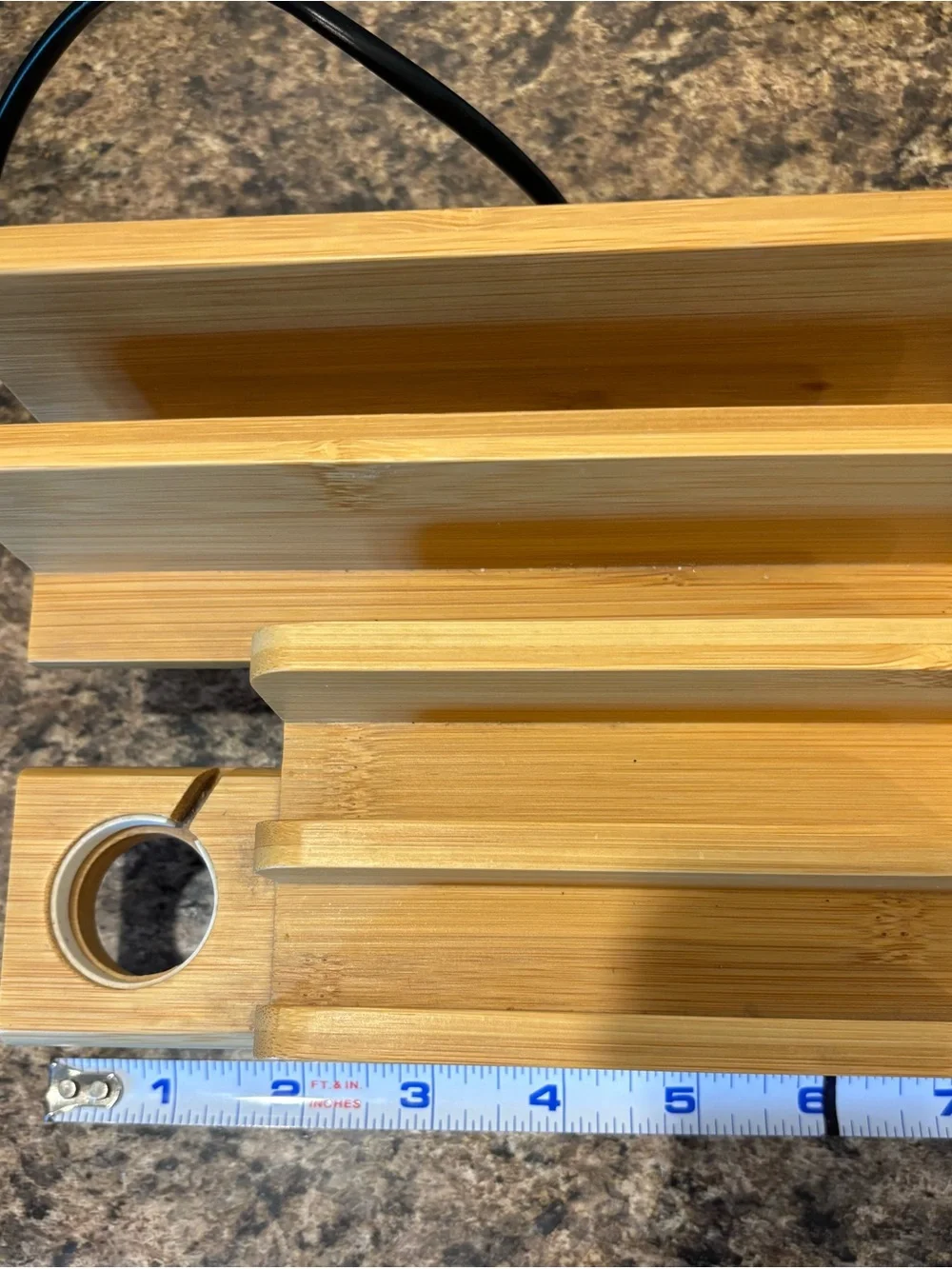 Bamboo organizer charging station with Apple Watch holder and 5 usb ports.
